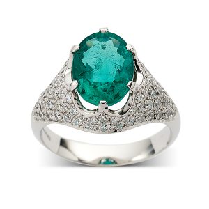 Emerald with pave-set diamond surround