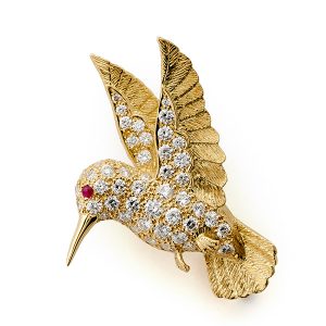 Humming bird with diamonds to wings and body