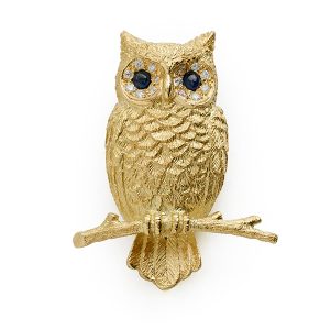 Owl with feathered body, sapphire eyes and diamonds