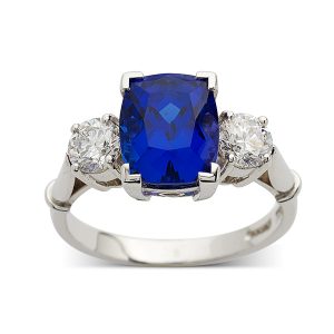 Sapphire cushion three stone