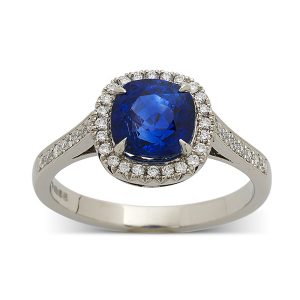Sapphire cushion with diamond surround