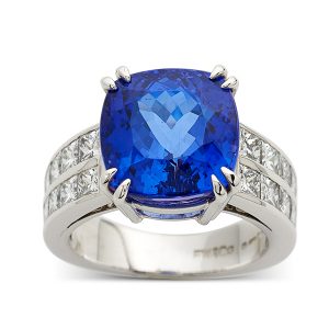 Sapphire ring with channel-set diamond shoulders