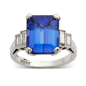 Sapphire with carved surround