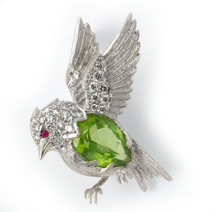 Bird in flight with peridot